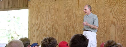 Bob Ditter speaks to summer camp counselors during staff training