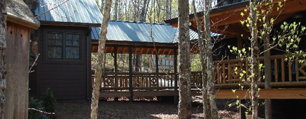 Breezeway connecting Deerfoot Lodge with Little Deer Lodge. Both facilities are available for group rental.