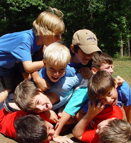 Mohawk and Cherokee tribe members pile on top of each other
